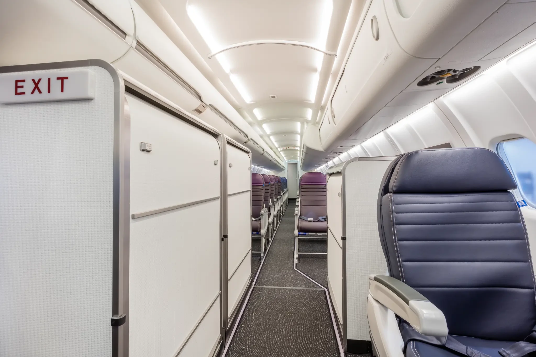 GAL Aerospace certified cabin retrofit program -- freshly reconfigured CRJ interior with new monument panels and premium seating